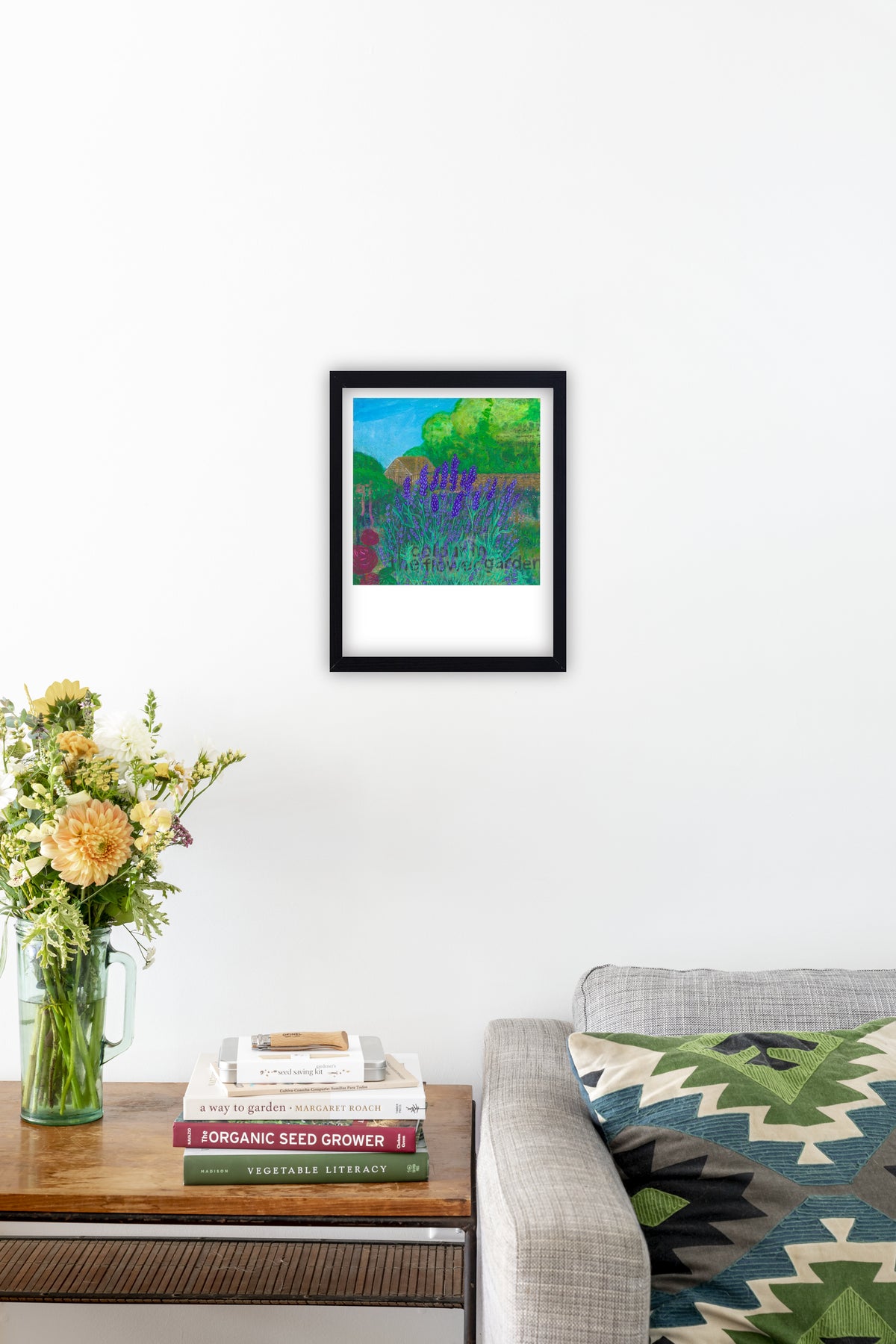 Fine art print of Munstead Lavender by Hudson Valley Seed Co. displayed in a room, showcasing vibrant lavender illustration.