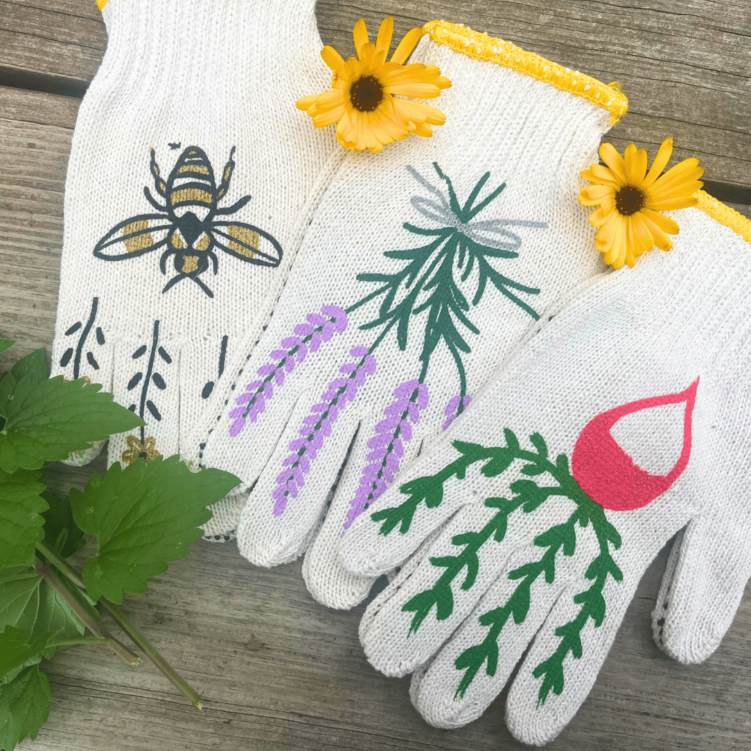 Pair of printed garden gloves by My Little Belleville, showing colorful floral patterns on durable gardening hand protection.