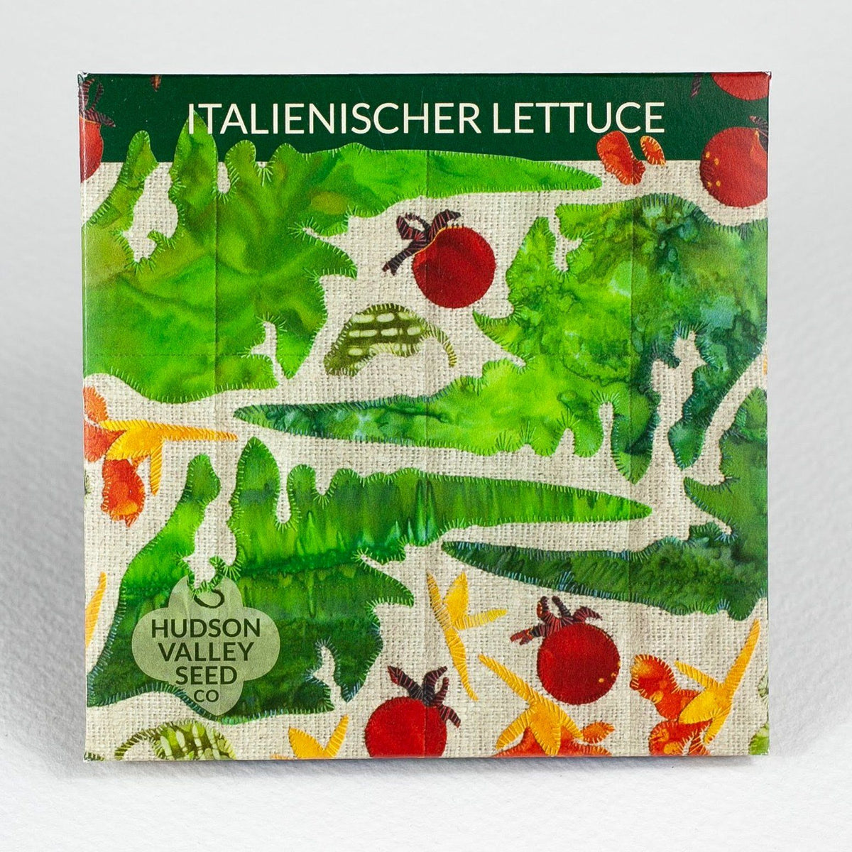 Fresh Italienischer Lettuce from Hudson Valley Seed Co, showcasing vibrant green leafy vegetables on a farm stand.