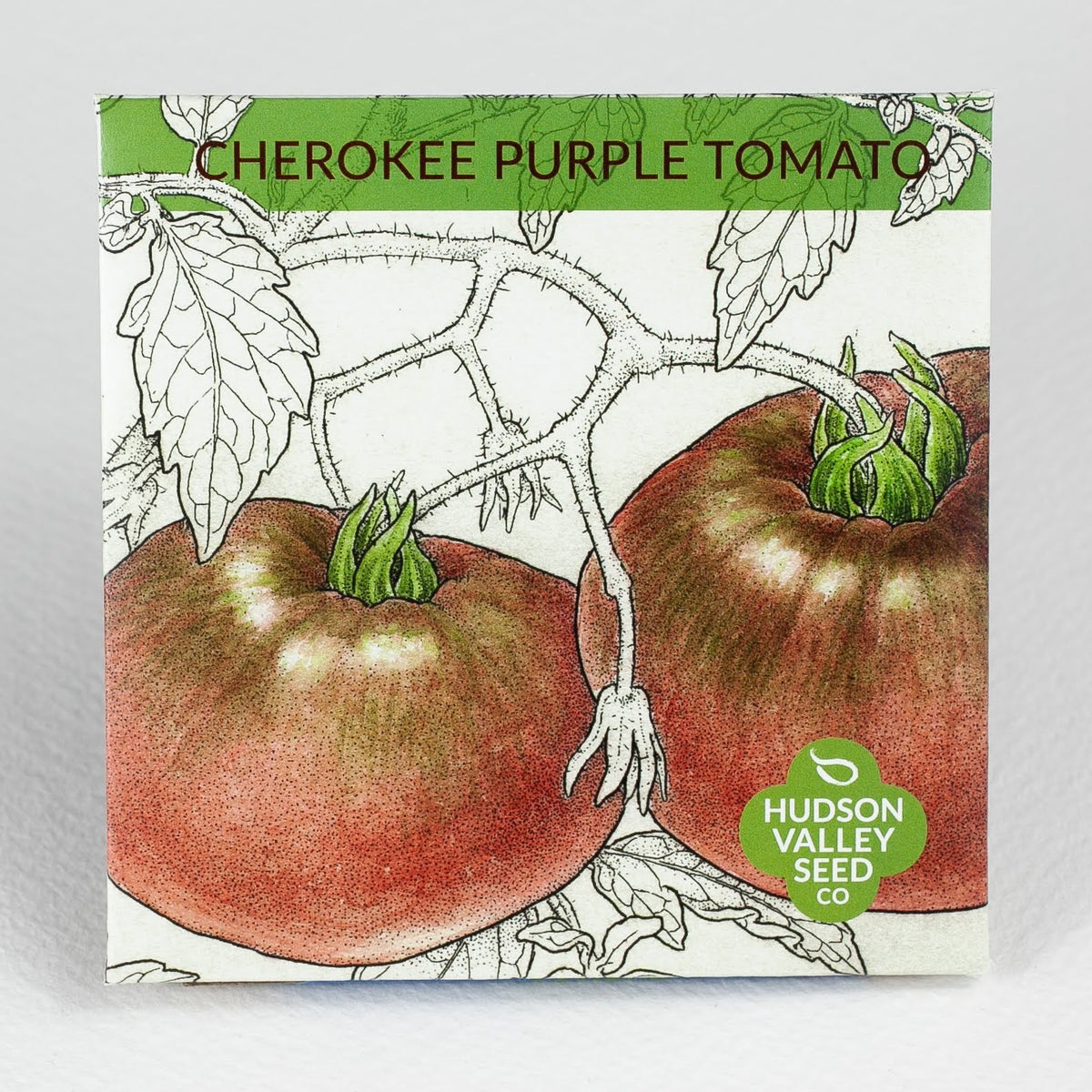 Organic Cherokee Purple Tomato seedlings from Hudson Valley Seed Co., showcasing healthy young vegetable plants.