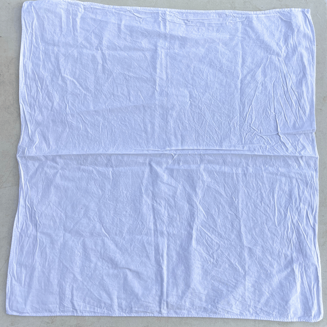 Pre-mordanted dyeable bandana from Botanical Colors, gift shop, featuring a soft fabric with a blank canvas for dyeing and decorating.