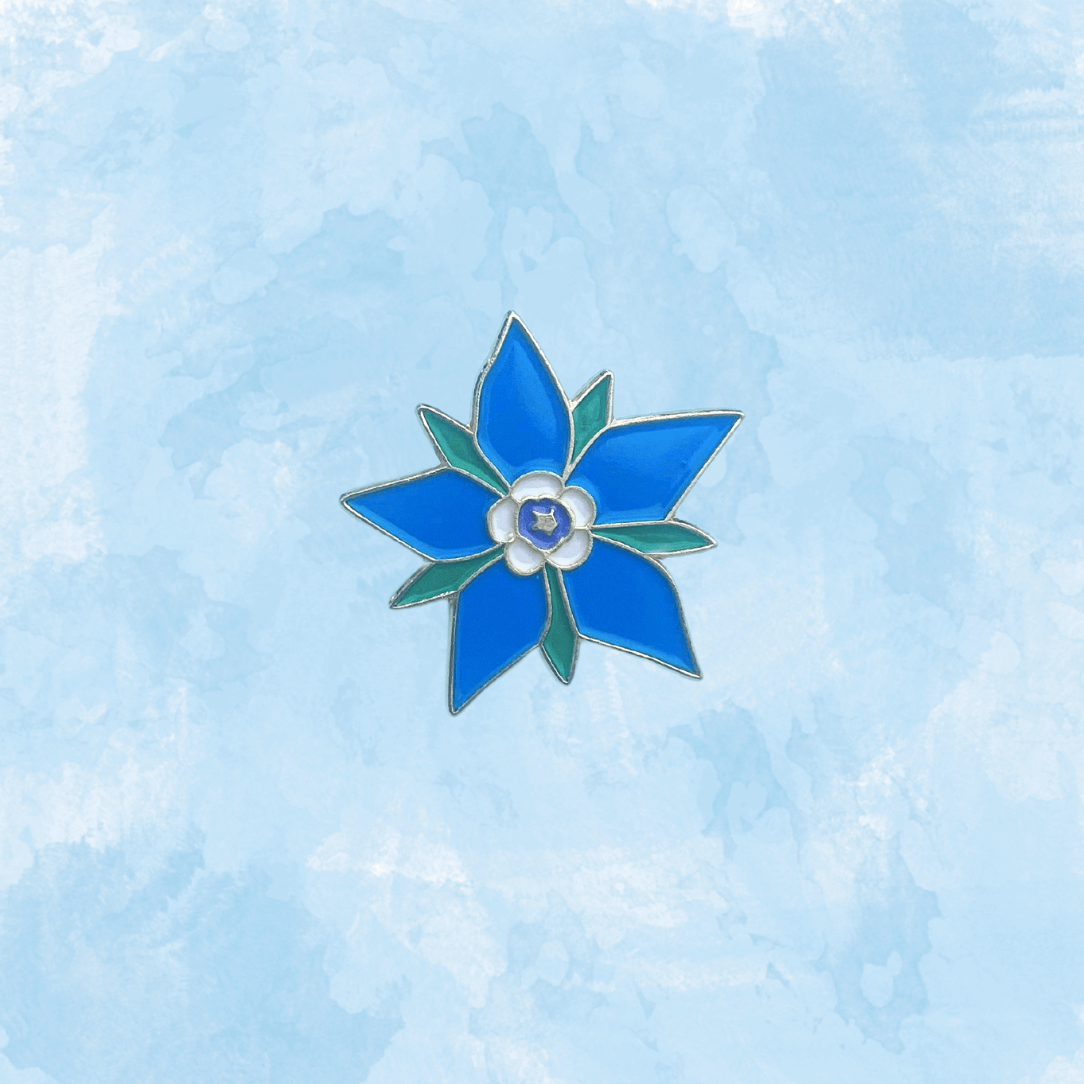 Borage enamel pin by Hudson Valley Seed Co. featuring a detailed borage flower design on a metal pin backing.