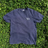Navy Hudson Valley Seed Co logo T-shirt featuring a simple design, made from soft fabric, displayed flat on a white background.