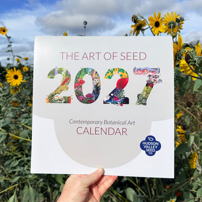 2027 Art of Seed Calendar by Hudson Valley Seed Co. featuring botanical illustrations on a decorative wall calendar.