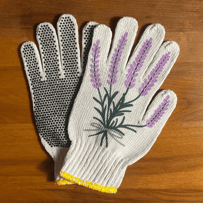 Pair of printed garden gloves by My Little Belleville with colorful floral patterns, suitable for gardening tasks.
