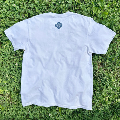 White Hudson Valley Seed Co logo t-shirt, casual cotton apparel with printed brand logo on front, ideal for gift or everyday wear.