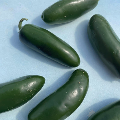 Fresh Nadapeno pepper, vibrant green vegetable from the peppers category, with a smooth surface and elongated shape.