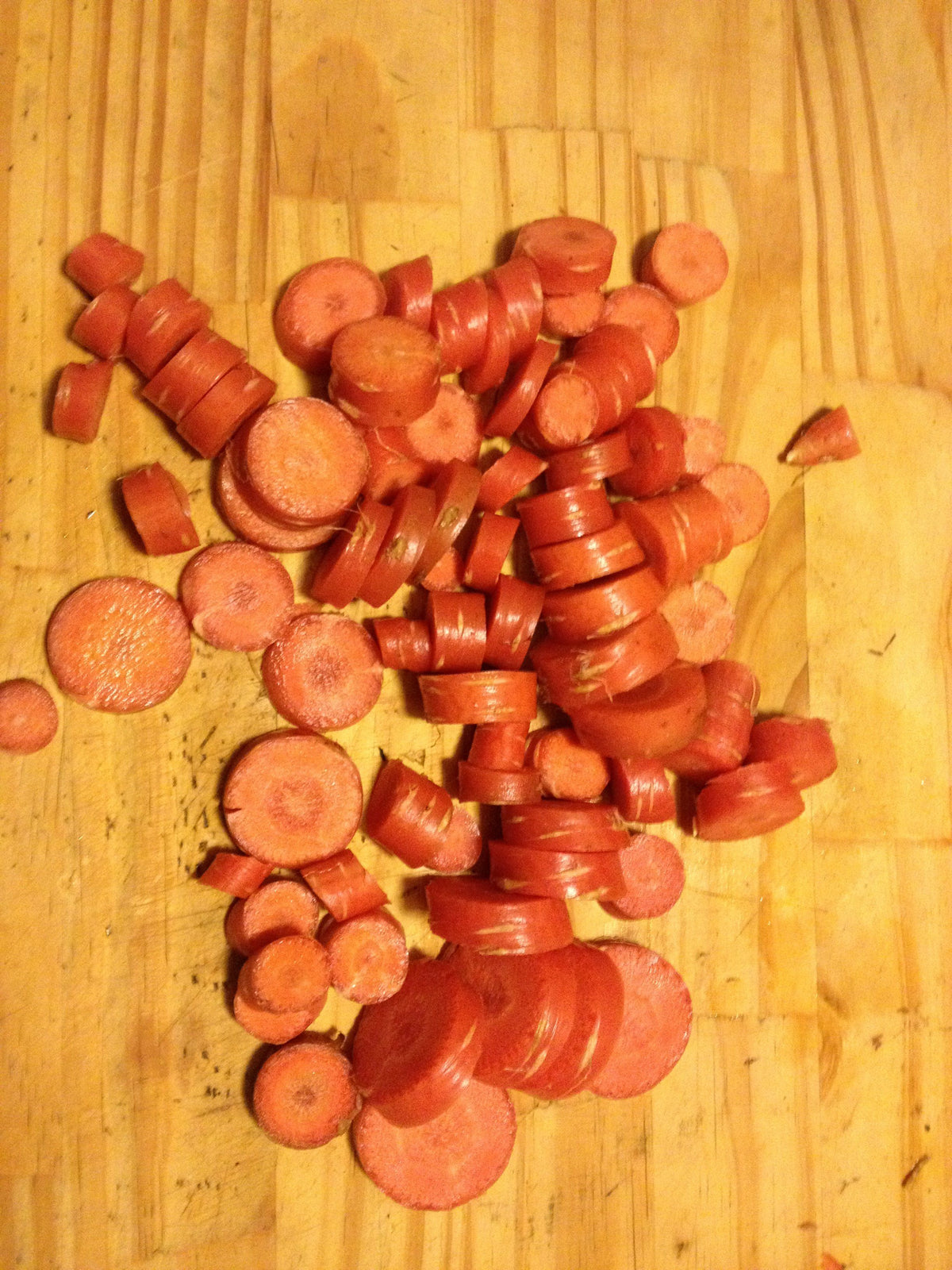 Fresh atomic red carrot from Hudson Valley Seed Co., showcasing vibrant orange-red color and crisp texture.