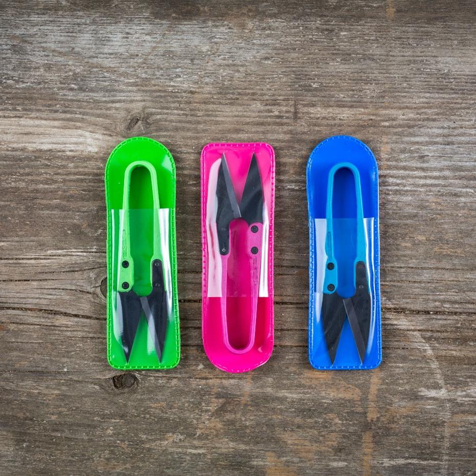 Close-up of Terrebonne Deadheads Mini-Snips, small precision tools with sharp blades for detailed cutting tasks.