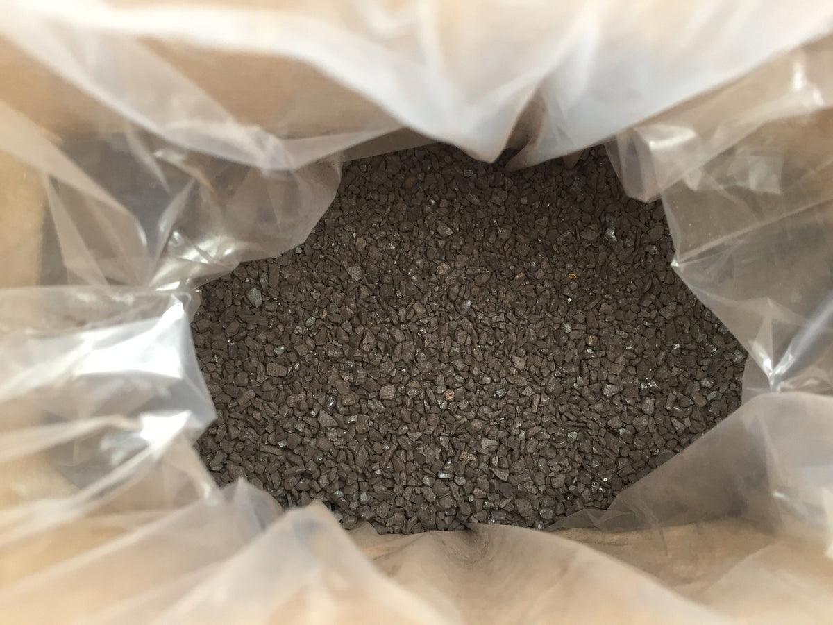 Mini Humic Acids Soil Amendment from Down To Earth, showing a small container of organic humic acids for gardening and plant health.