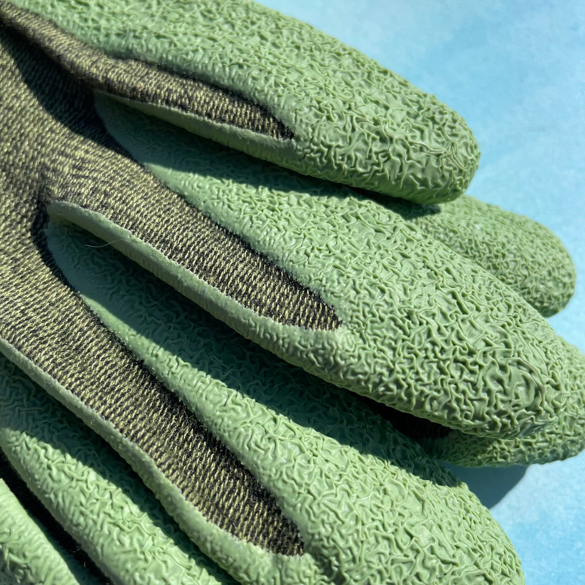 Natural rubber palm gloves from The Bamboo Gardener, made of bamboo rayon, suitable for gardening tools and supplies.