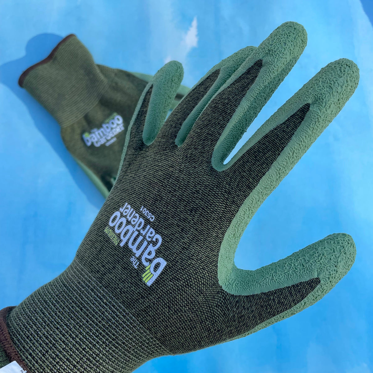 Bamboo Rayon and natural rubber palm gardening gloves with reinforced fingertips, designed for gardening and outdoor work.