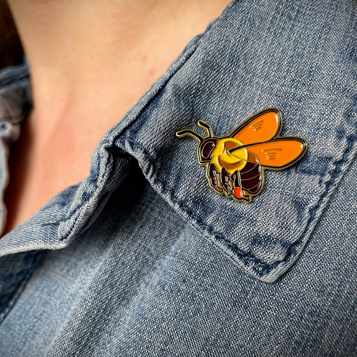 Bee Nectary enamel pin by Hudson Valley Seed Co. featuring a detailed bee design on a metal pin.