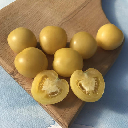 Fresh Mandurang Moon Tomato from Hudson Valley Seed Co., showcasing vibrant, ripe vegetables on display at a vendor stall.