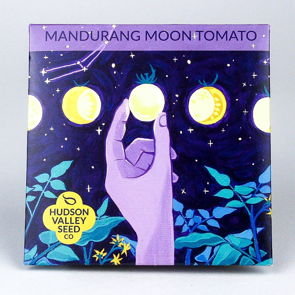 Fresh Mandurang Moon Tomato from Hudson Valley Seed Co., showcasing vibrant red vegetables with a smooth skin.