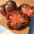 Purple Heart Tomato vegetable from Hudson Valley Seed Co., showing vibrant purple and red heirloom tomatoes on the vine.