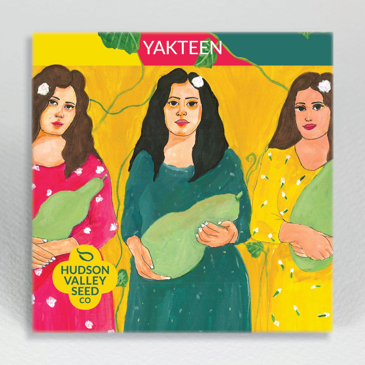 Fresh Yakteen gourd vegetable from Hudson Valley Seed Co., displayed on a vendor table with other seasonal produce.